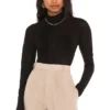 L'Academie Tissue Turtleneck In Black